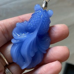 Carved blue goldfish pendant necklace